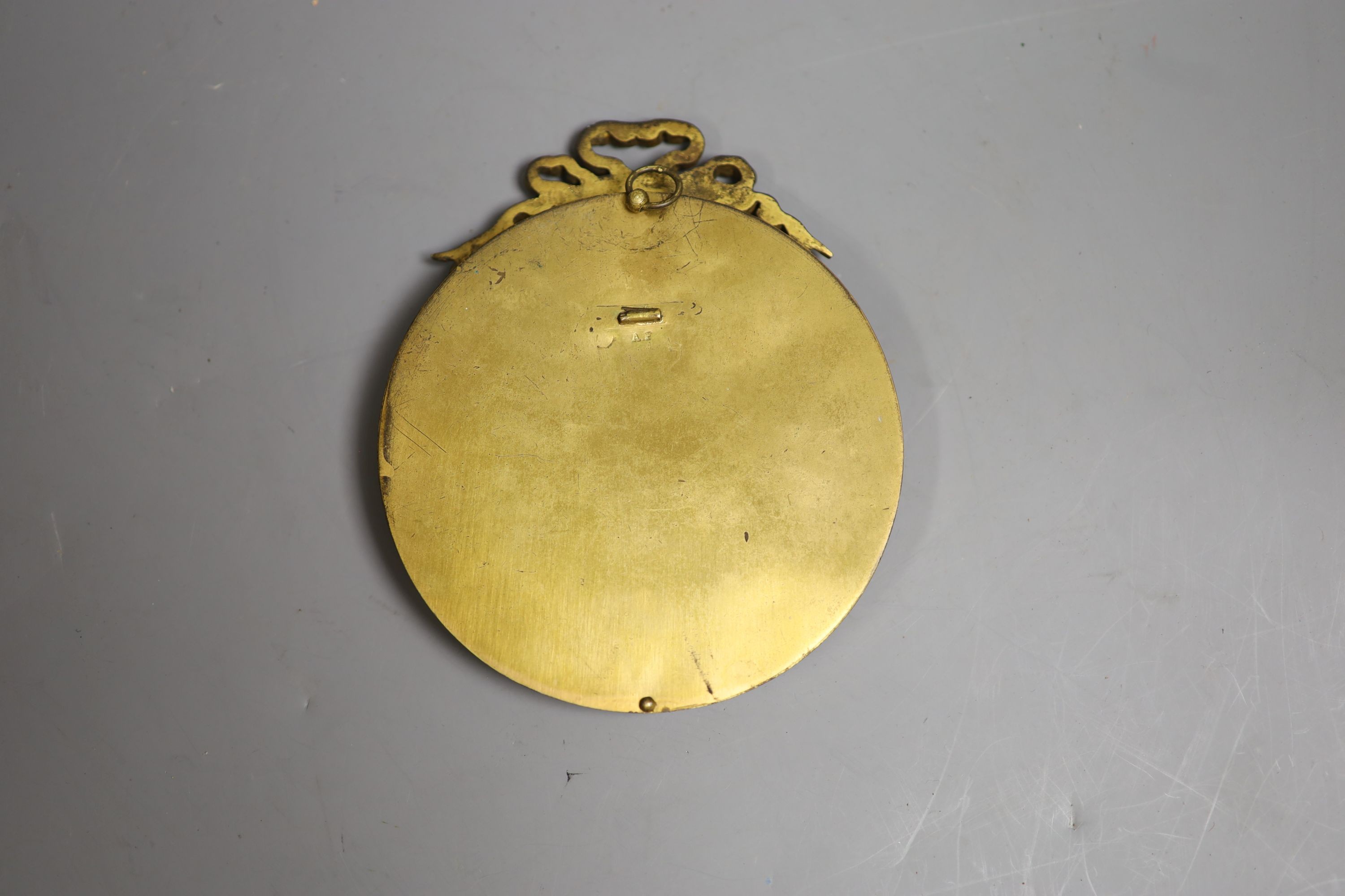 A French convex enamelled plaque in gilt frame, panel 11cm diameter